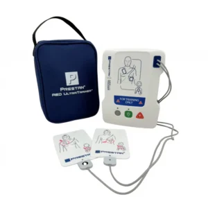 PRESTAN AED Ultratrainer device on training table with electrode pads attached